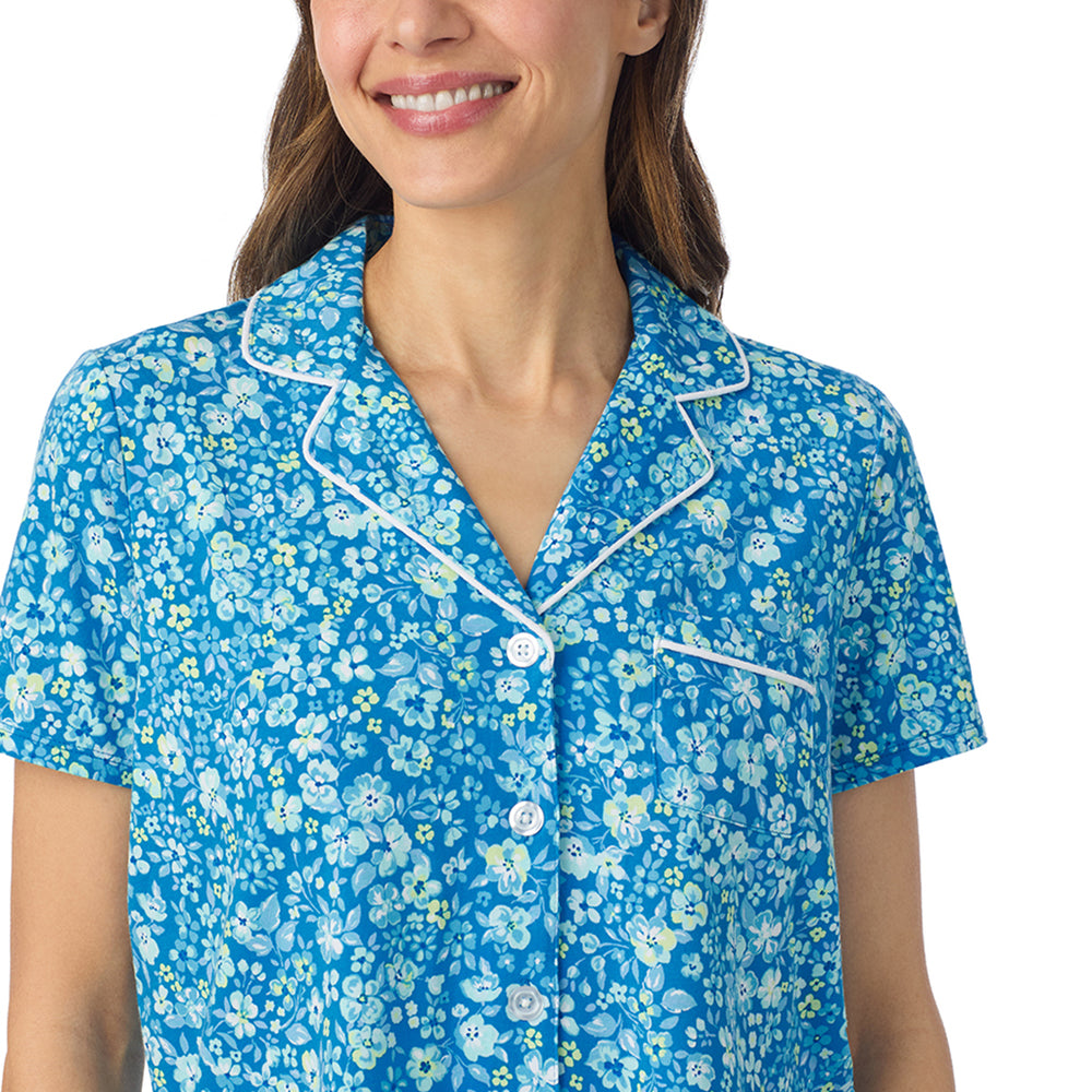 A lady wearing Cotton-Blend Short Sleeve Notch Collar with Cropped Pant Pajama Set in Blue Ditsy posing close up view pose