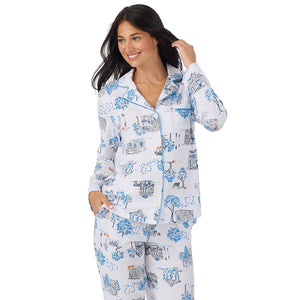 A lady wearing Cotton-Blend Long Sleeve Notch Collar with Long Pant Pajama Set in White Halloween closer look looking side