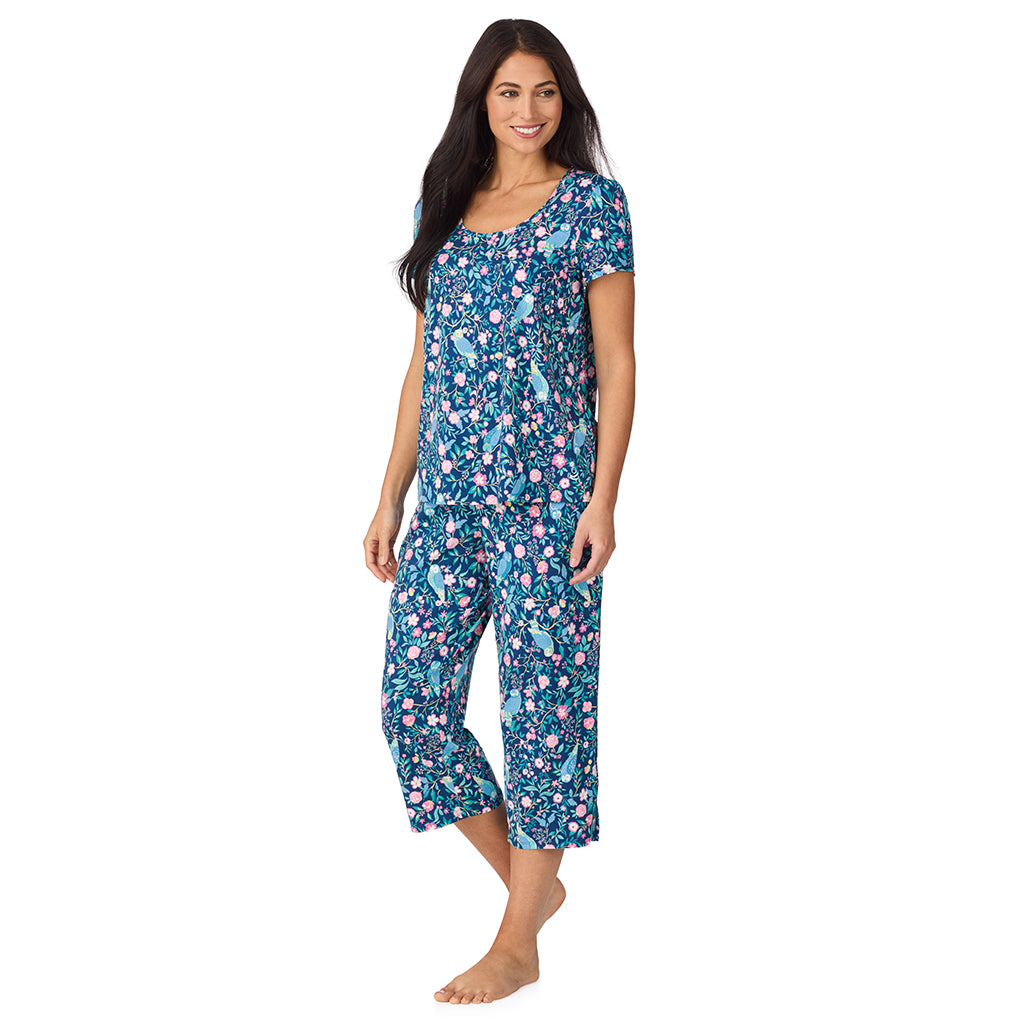 Dark Blue Owl; Model is wearing size S. She is 5'8.5", Bust 32", Waist 25", Hips 36". @A lady wearing Cotton-Blend Short Sleeve Top with Cropped Pant with Scallop Detail 2-Pc Pajama Set in Dark Blue Owl