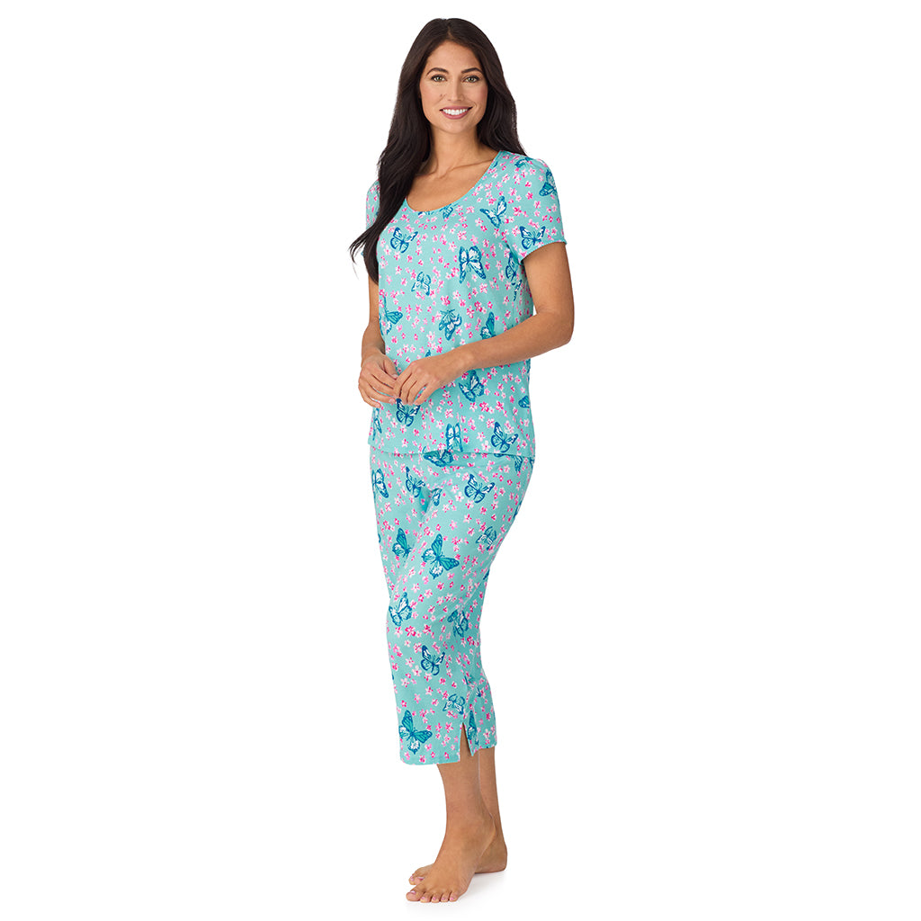 Aqua Butterfly; Model is wearing size S. She is 5'8.5", Bust 32", Waist 25", Hips 36". @A lady wearing Cotton-Blend Short Sleeve Top with Cropped Pant with Scallop Detail 2-Pc Pajama Set in Aqua Butterfly