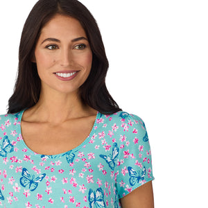 A lady wearing Cotton-Blend Short Sleeve Top with Cropped Pant with Scallop Detail 2-Pc Pajama Set in Aqua Butterfly
