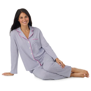 A lady wearing Cotton-Blend Long Sleeve Notch Collar with Long Pant Pajama Set in Grey Stripe sitting down