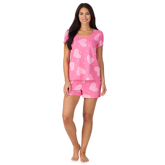 A lady wearing Cotton-Blend Short Sleeve Top with Short Pajama Set in Pink Flower Heart