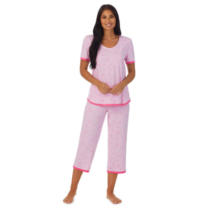 Small Pink Hearts;Model is wearing size S. She is 5'8.5", Bust 32", Waist 25", Hips 36".@A lady wearing  pink  Short Sleeve Crew Neck Pajama Set