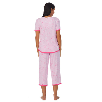 Small Pink Hearts;Model is wearing size S. She is 5'8.5", Bust 32", Waist 25", Hips 36".@A lady wearing  pink  Short Sleeve Crew Neck Pajama Set