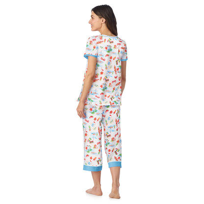  A lady wearing Cotton-Blend Short Sleeve Top and Cropped Pant Pajama Set in Summer Landscape posing back view pose