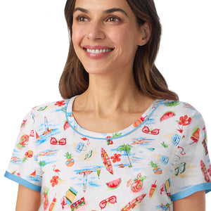  A lady wearing Cotton-Blend Short Sleeve Top and Cropped Pant Pajama Set in Summer Landscape posing front close up view pose