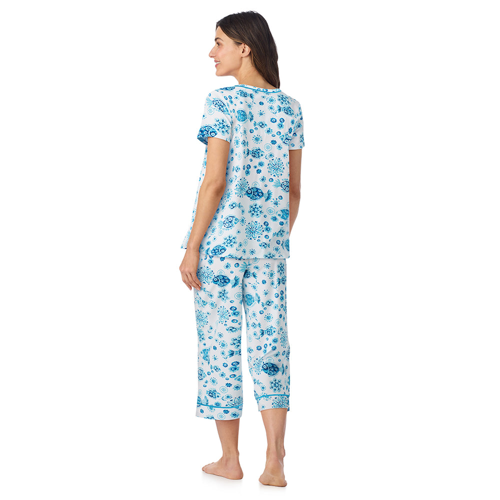 A lady wearing Cotton-Blend Short Sleeve Top and Cropped Pant Pajama Set in Fish posing back view pose