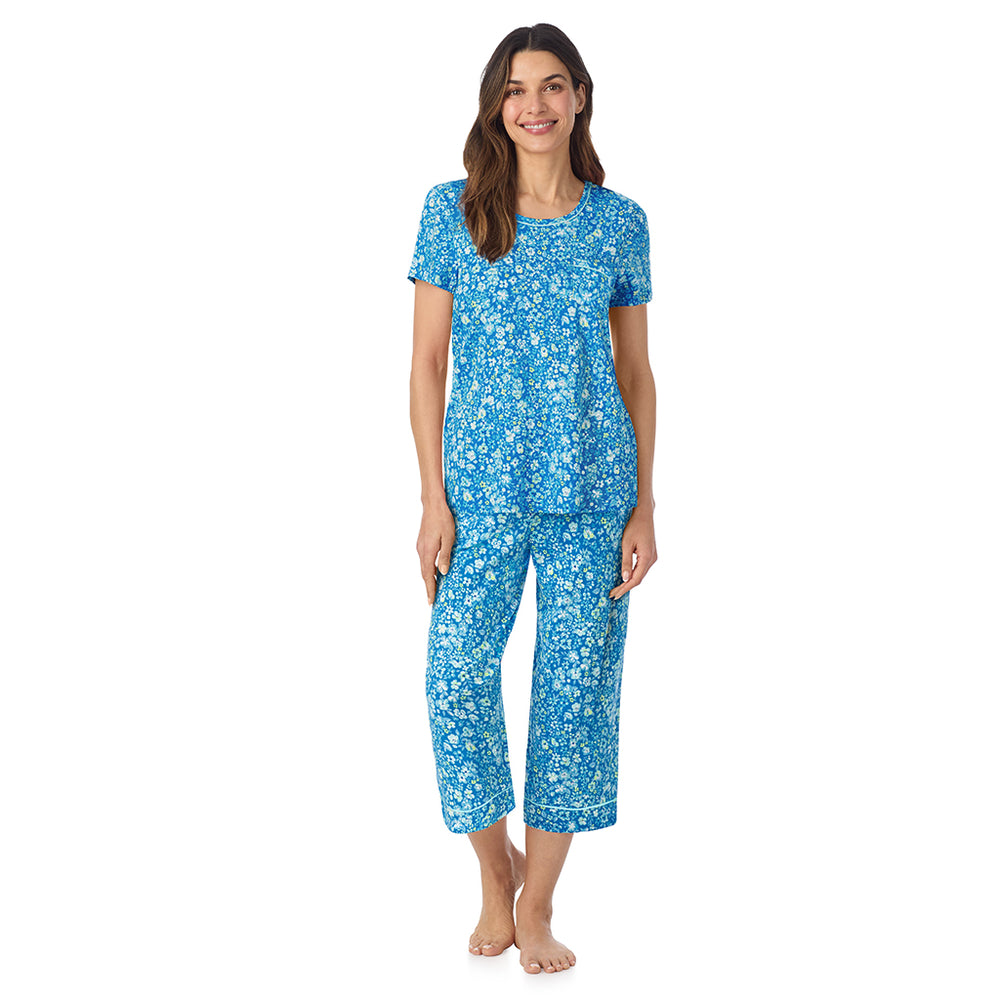 A lady wearing Cotton-Blend Short Sleeve Top and Cropped Pant Pajama Set in Blue Ditsy posing front view pose