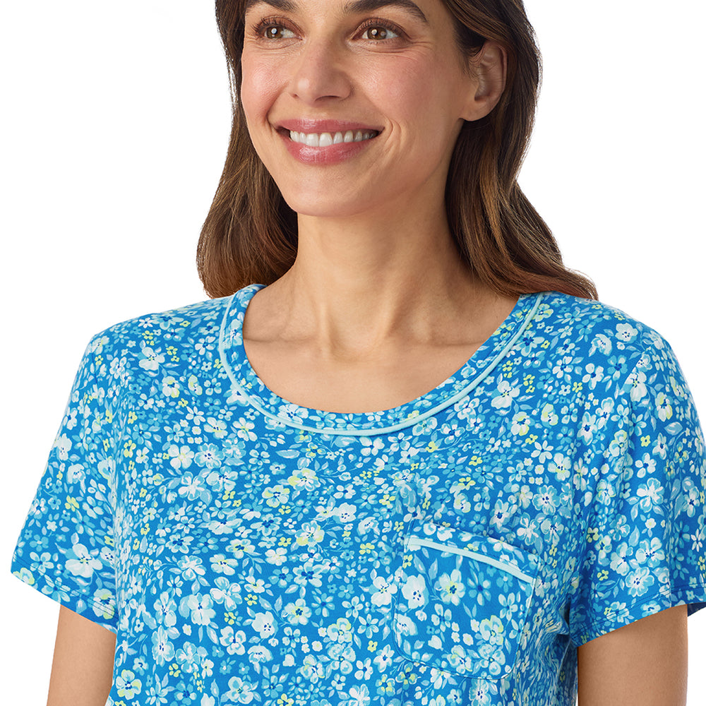 A lady wearing Cotton-Blend Short Sleeve Top and Cropped Pant Pajama Set in Blue Ditsy posing close up detail view pose