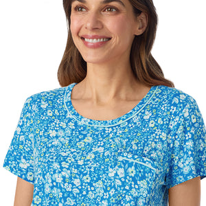  A lady wearing Cotton-Blend Short Sleeve Top and Cropped Pant Pajama Set in Blue Ditsy posing close up detail view pose