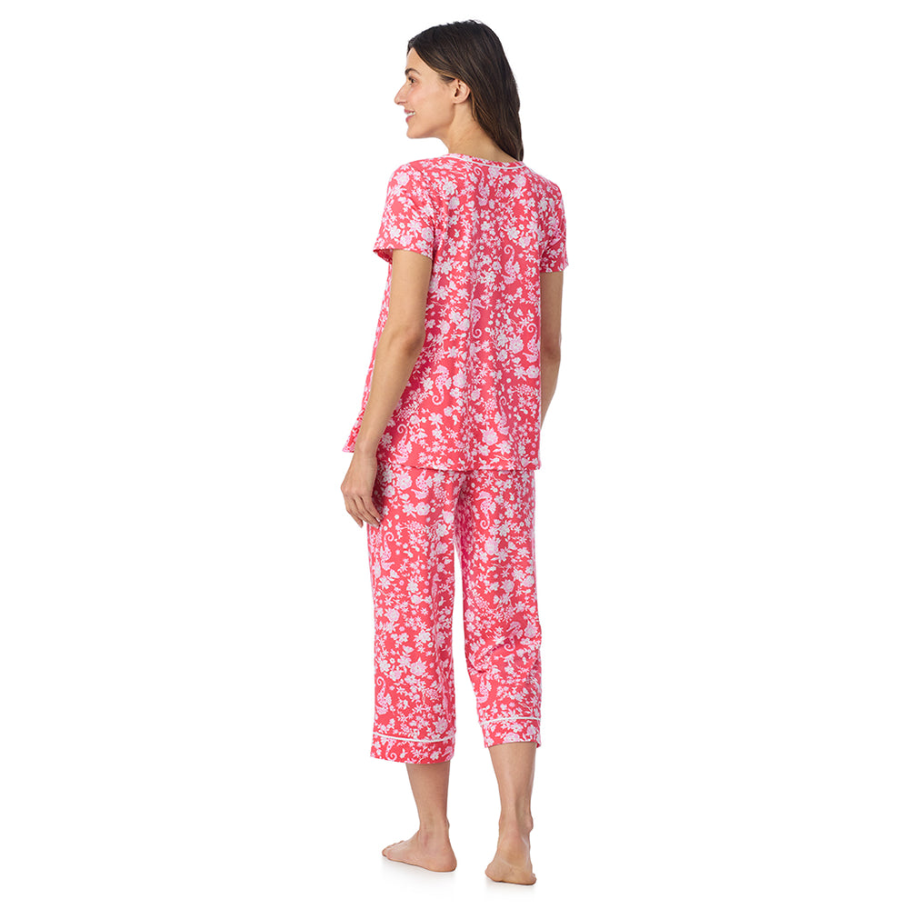 A lady wearing Cotton-Blend Short Sleeve Top and Cropped Pant Pajama Set in Seahorse posing back view pose