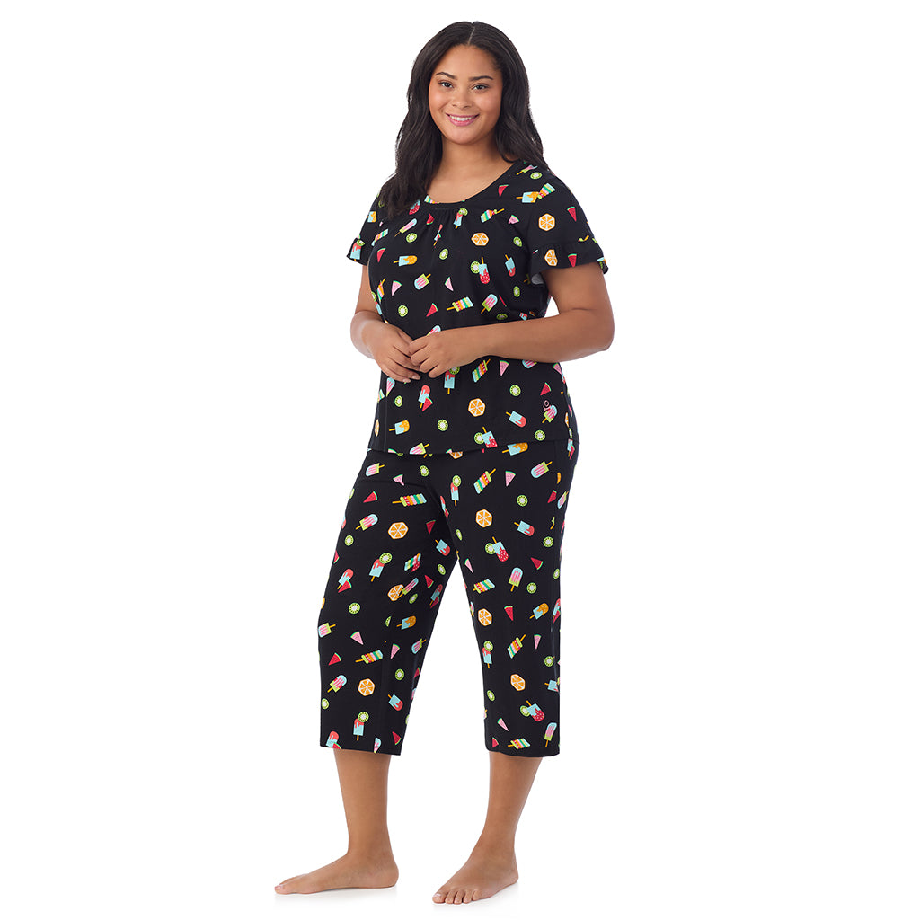A lady wearing Cotton-Blend Ruffle Short Sleeve Top and Cropped Pants Pajama Set in Icepop print