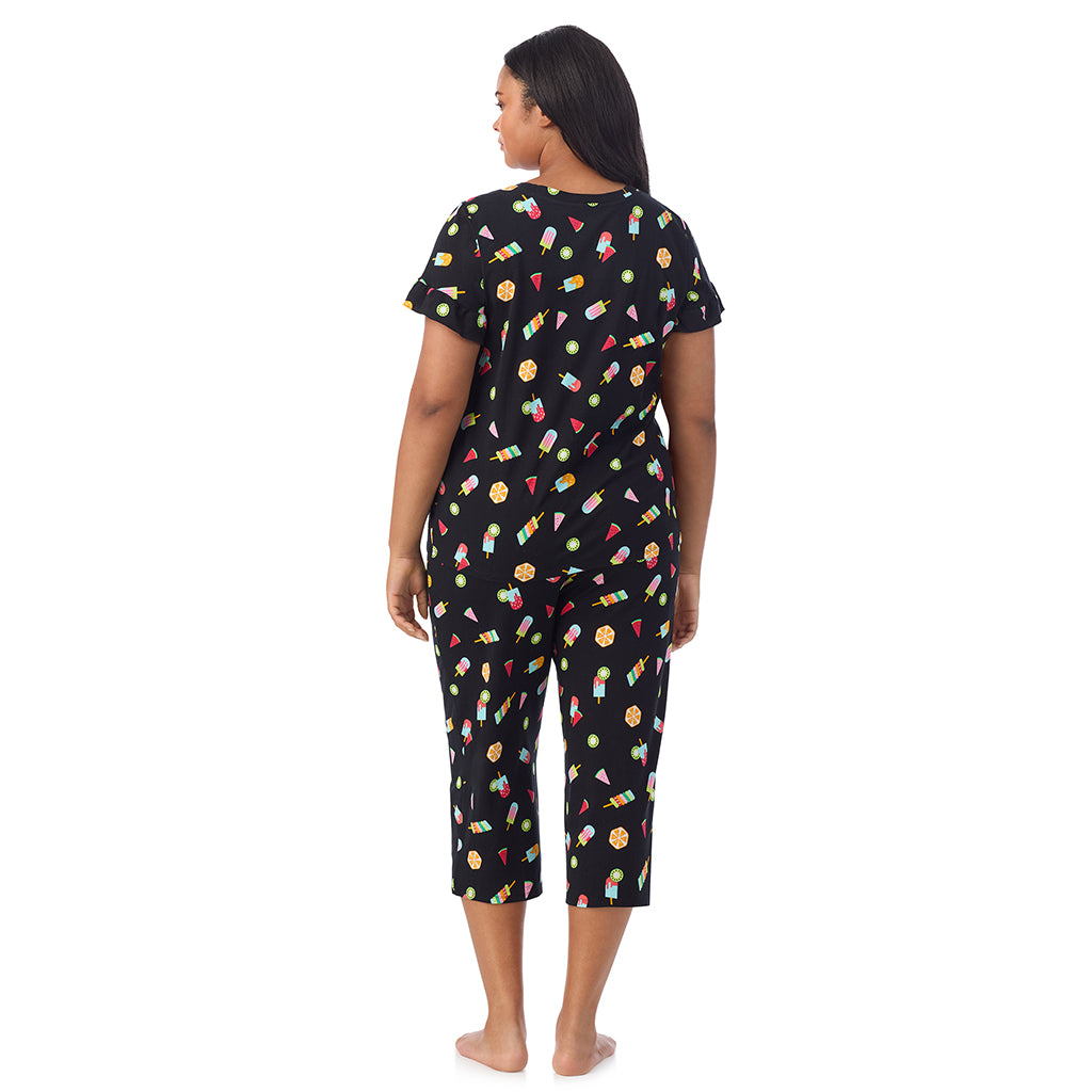 A lady wearing Cotton-Blend Ruffle Short Sleeve Top and Cropped Pants Pajama Set in Icepop print