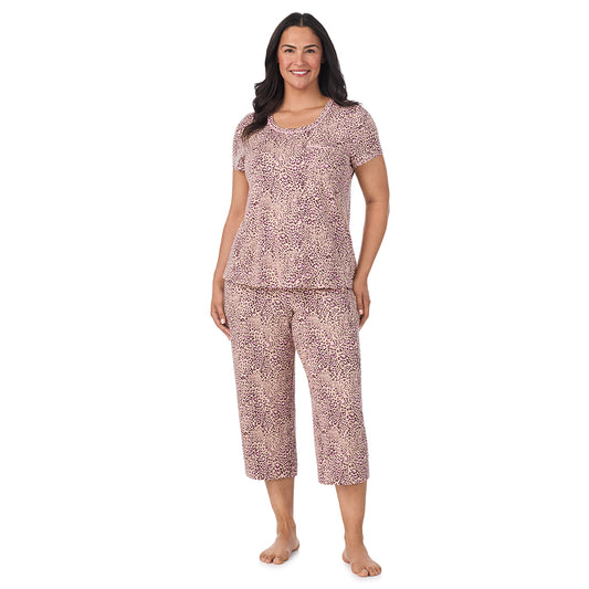 A lady wearing a Leopard Animal Cotton Rich Short Sleeve Top with Cropped Pant Pajama Set PLUS
