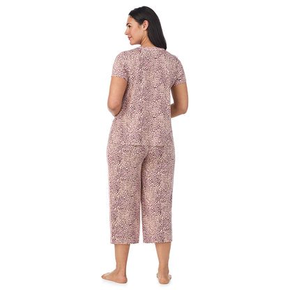 Leopard Animal; Model is wearing size 1X. She is 5'10", Bust 40", Waist 33", Hips 47". @A lady wearing a Leopard Animal Cotton Rich Short Sleeve Top with Cropped Pant Pajama Set PLUS
