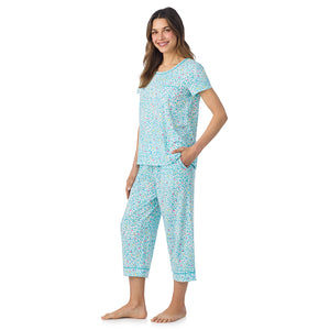  A lady wearing Cotton-Blend Short Sleeve Top and Cropped Pant Pajama Set in Teal Heart Animal posing side angle view pose