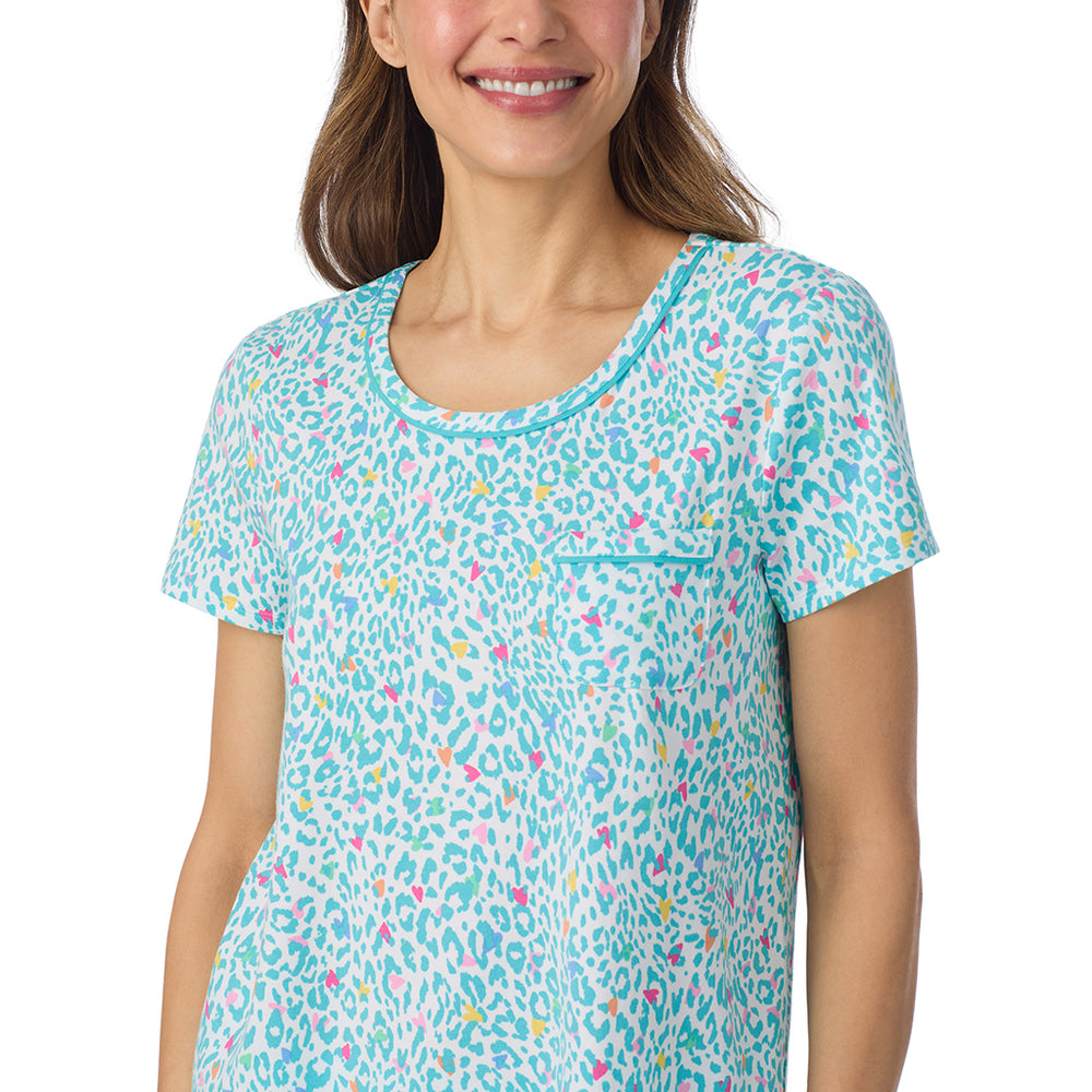 A lady wearing Cotton-Blend Short Sleeve Top and Cropped Pant Pajama Set in Teal Heart Animal posing front close up view pose