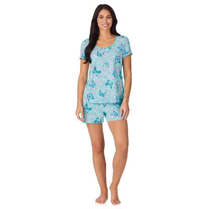 A lady wearing Cotton-Blend Short Sleeve Top with Short Pajama Set in Aqua Butterfly