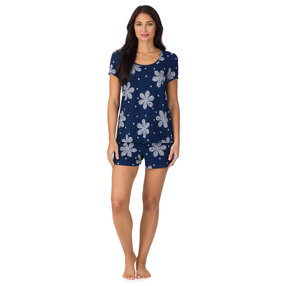 A lady wearing Cotton-Blend Short Sleeve Top with Short Pajama Set in Navy Flower Print