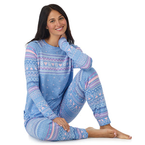  A lady wearing Peri Blue Heart Fairisle Brushed Sweater Knit Long Sleeve Jogger Pajama Set in a front view sitting pose