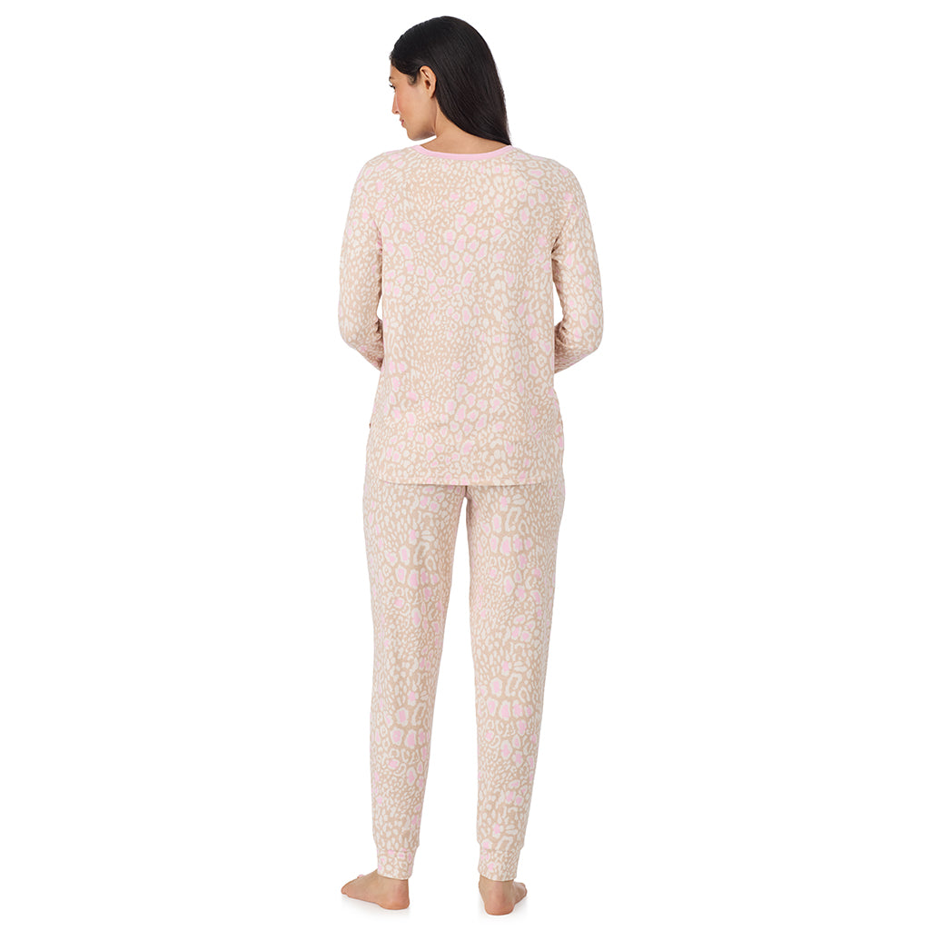  A lady wearing Oatmeal Animal Brushed Sweater Knit Long Sleeve Jogger Pajama Set in a back view pose
