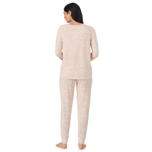  A lady wearing Oatmeal Animal Brushed Sweater Knit Long Sleeve Jogger Pajama Set in a back view pose