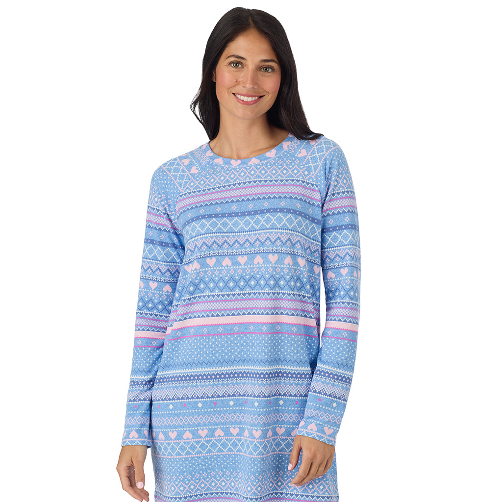  A lady wearing Peri Blue Heart Fairisle Brushed Sweater Knit Long Sleeve Sleepshirt in a front view closer look with a smile on her face