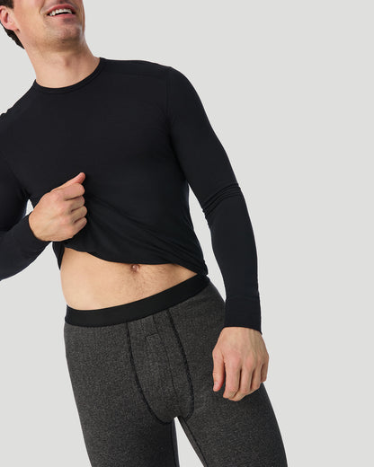  A man wearing Grey Stripe FlexStripe Pant in a front view standing pose while looking to the side