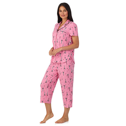 A lady wearing Cotton Rich Short Sleeve Notch Collar Top with Cropped Pant Pajama Set