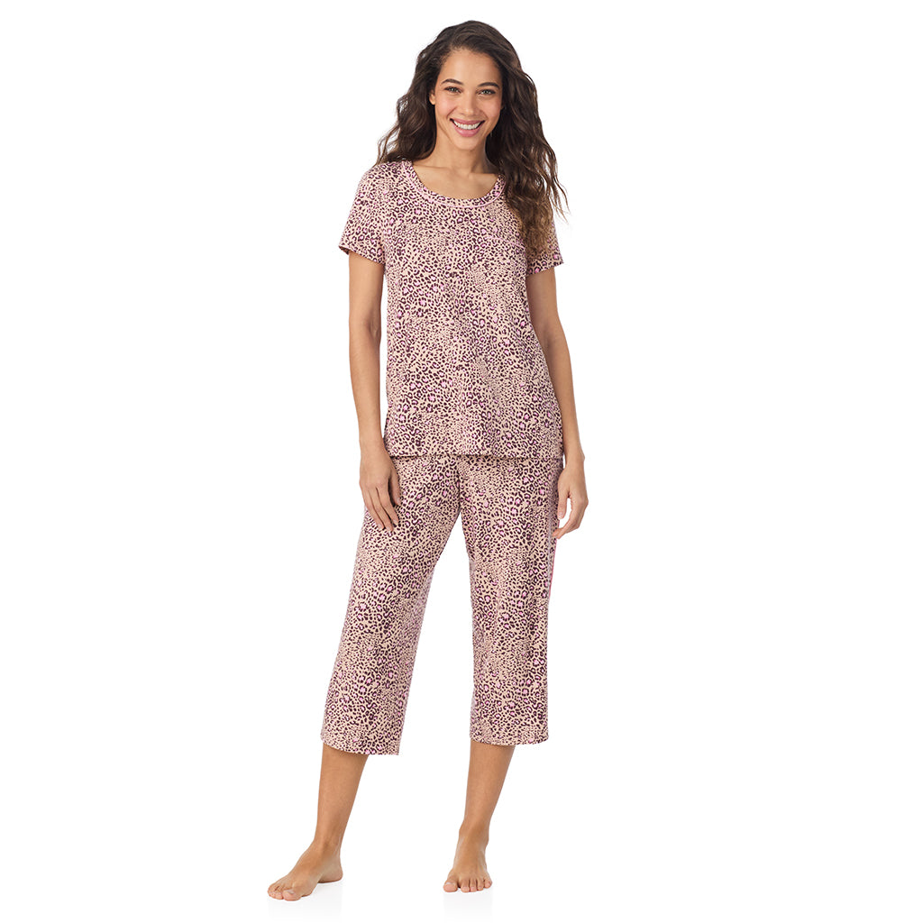 A lady wearing a Leopard Animal Cotton Rich Short Sleeve Top with Cropped Pant Pajama Set