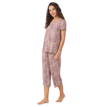 Leopard Animal; Model is wearing size S. She is 5’9”, Bust 34”, Waist 23”, Hips 35”.@A lady wearing a Leopard Animal Cotton Rich Short Sleeve Top with Cropped Pant Pajama Set