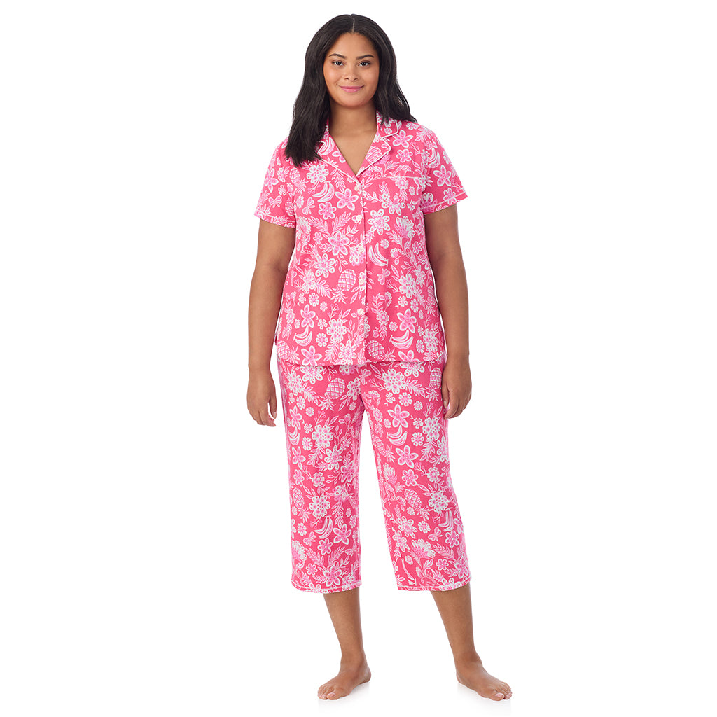 A lady wearing Cotton-Blend Short Sleeve Notch Collar with Cropped Pant Pajama Set in pink tropical print
