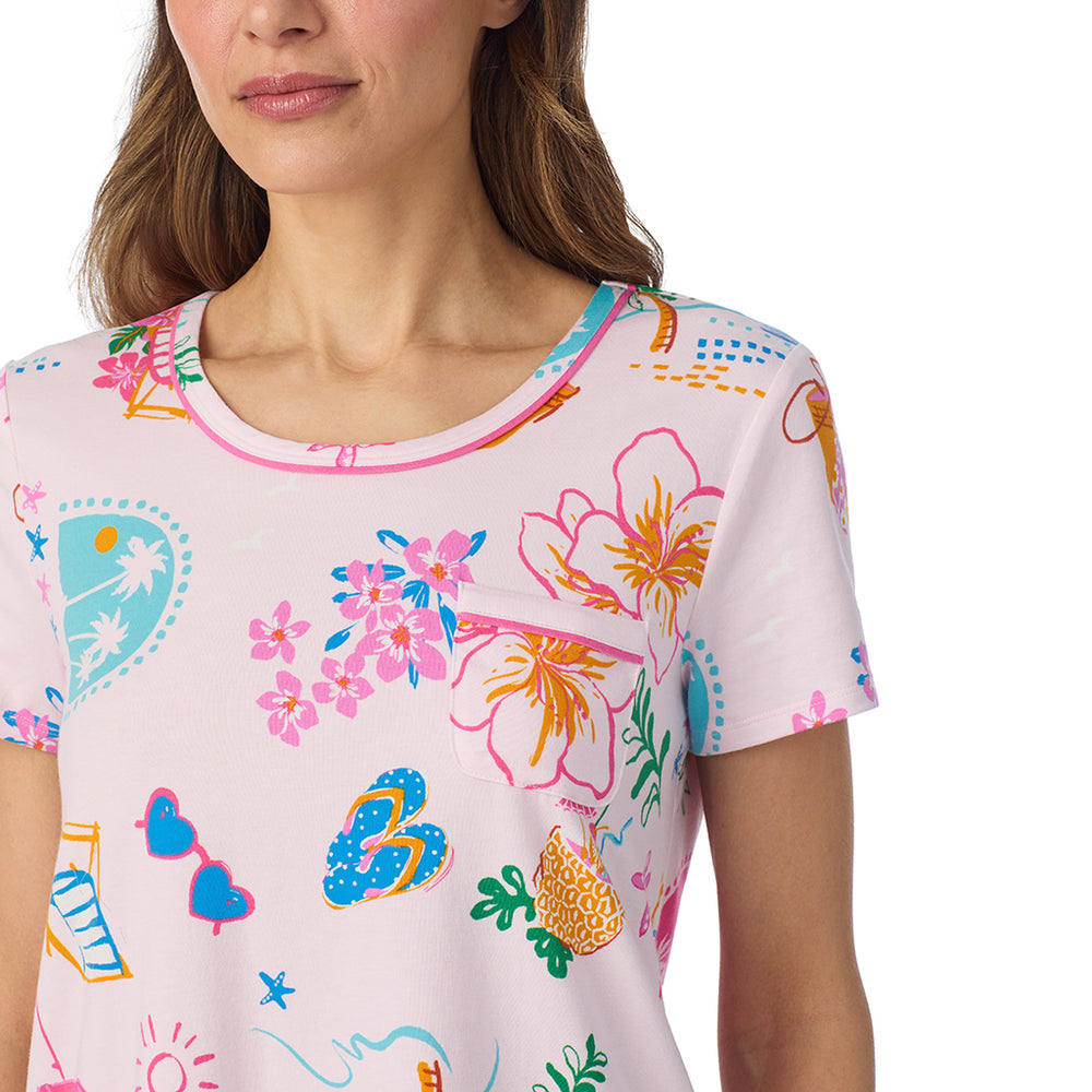 A lady wearing Cotton-Blend Short Sleeve Top and Cropped Pant Pajama Set in Pink Summer Scene posing front close up view pose