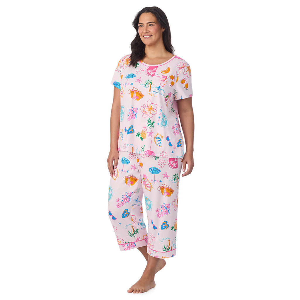 Pink Summer Scene; Model is wearing size 1X. She is 5'10", Bust 40", Waist 33", Hips 47". @ A Plus size lady wearing Cotton-Blend Sleeveless Sleep Midi-Gown PLUS in Pink Summer Scene posing side angle view pose