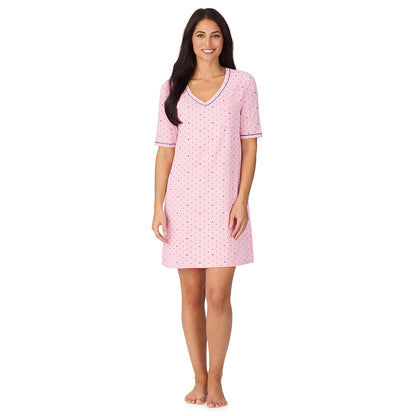  A lady wearing Cuddl Smart Elbow Sleeve Sleep Tee with Pink bow print