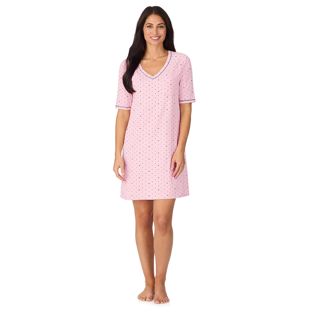 A lady wearing Cuddl Smart Elbow Sleeve Sleep Tee with Pink bow print