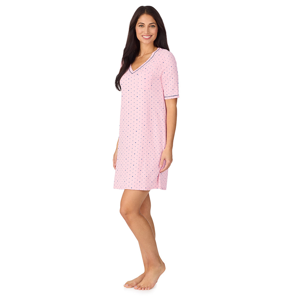  A lady wearing Cuddl Smart Elbow Sleeve Sleep Tee with Pink bow print