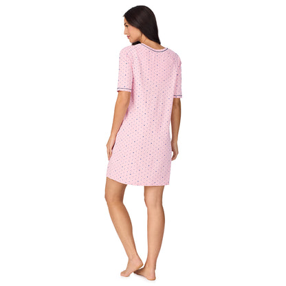  A lady wearing Cuddl Smart Elbow Sleeve Sleep Tee with Pink bow print
