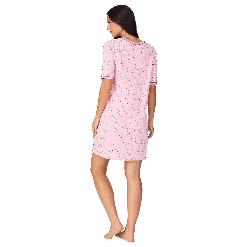 A lady wearing Cuddl Smart Elbow Sleeve Sleep Tee with Pink bow print