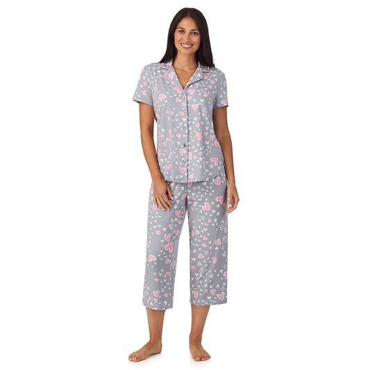 A lady wearing Cotton Rich Short Sleeve Notch Collar Top with Cropped Pant Pajama Set