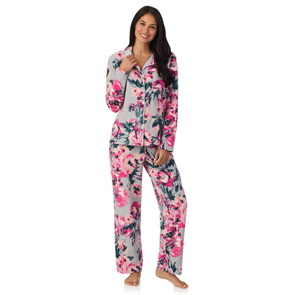 A lady wearing Cuddl Duds x Jennifer Lake Fleece with Stretch Long Sleeve Notch Collar Top with Pant Pajamas