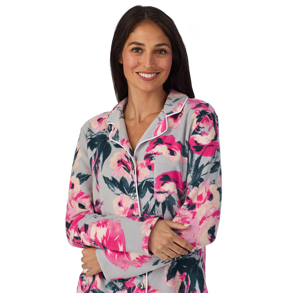 A lady wearing Cuddl Duds x Jennifer Lake Fleece with Stretch Long Sleeve Notch Collar Top with Pant Pajamas