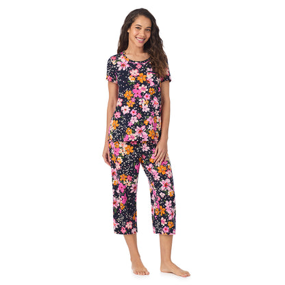 A lady wearing a Big Floral Cotton Rich Short Sleeve Top with Cropped Pant Pajama Set