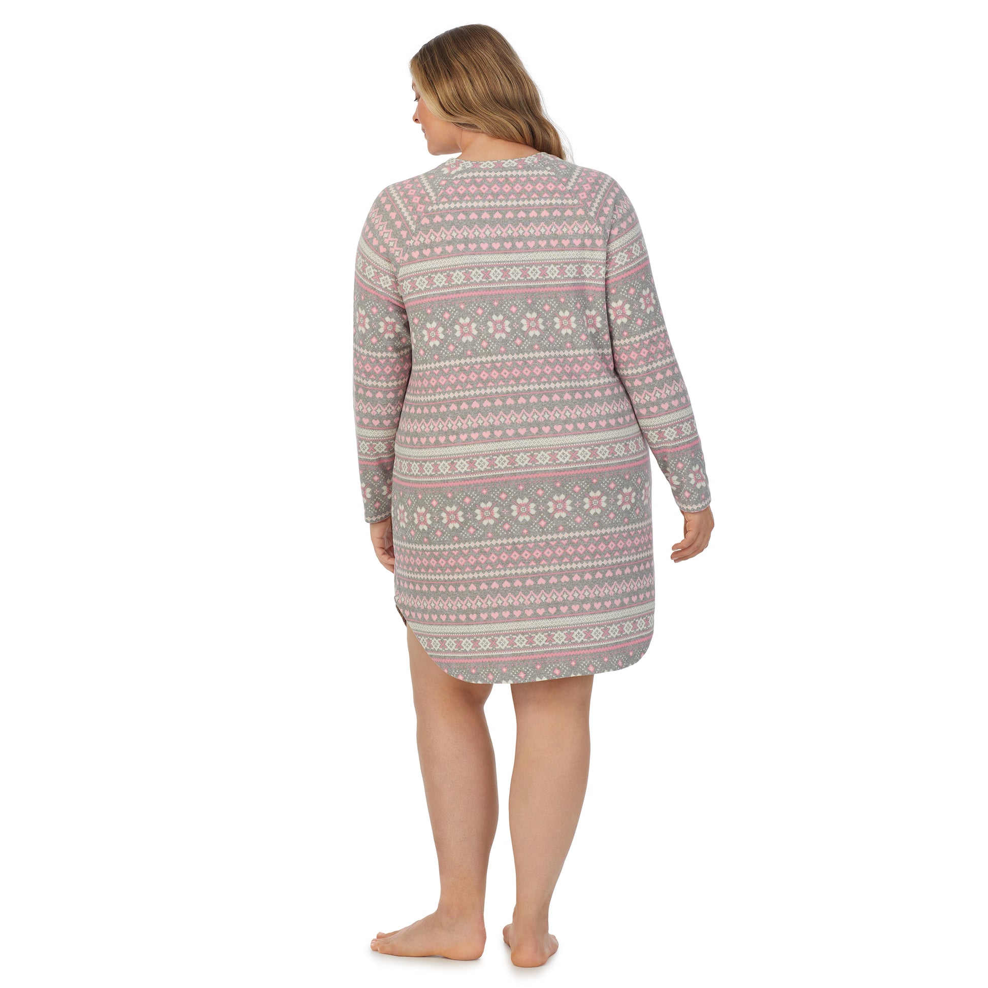 A lady wearing grey pink fairisle long sleeve brushed sweater knit plus sleepshirt.