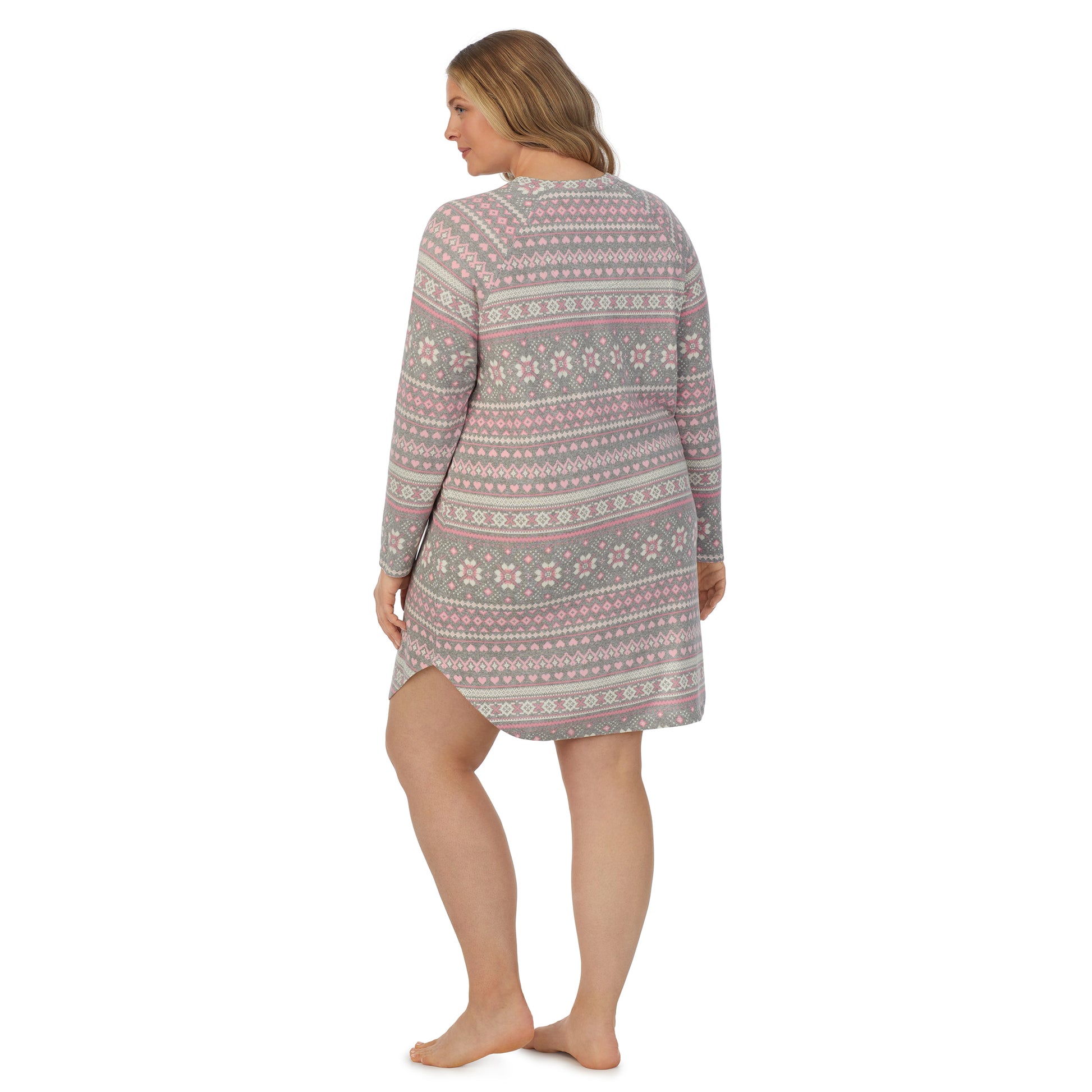 A lady wearing grey pink fairisle long sleeve brushed sweater knit plus sleepshirt.