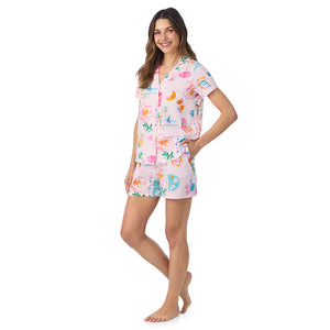 A lady wearing Cotton-Blend Short Sleeve Notch Collar with Short 2-Pc Pajama Set in Pink Summer Scene posing side angle view pose