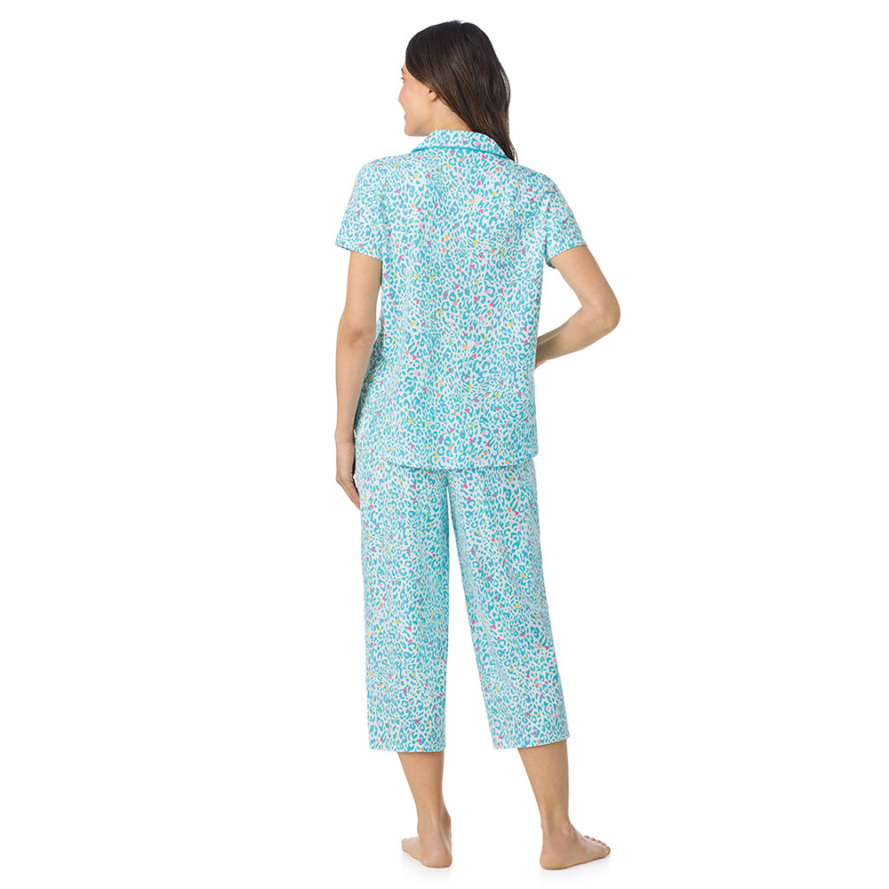 A lady wearing Cotton-Blend Short Sleeve Notch Collar with Cropped Pant Pajama Set in Teal Heart Animal posing back view pose