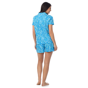  A lady wearing Cotton-Blend Short Sleeve Notch Collar with Short 2-Pc Pajama Set in Blue Ditsy posing back view pose