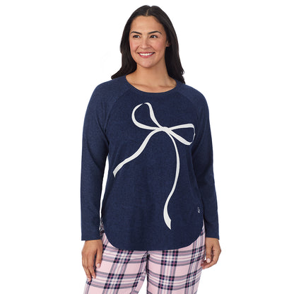 Pink Plaid with Bow; Model is wearing size 1X. She is 5'10", Bust 40", Waist 33", Hips 47".@A lady wearing a Pink Plaid with Bow Brushed Sweater Knit Long Sleeve Pajama Set PLUS